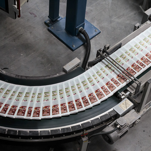 Equipment & Technology Printer equipment with multiple print brochures on the line