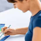 Image: person looking on print color swatches