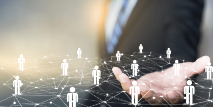 Customer Communications Management (CCM) and Why You Need It Person holding hand with stick figure customers