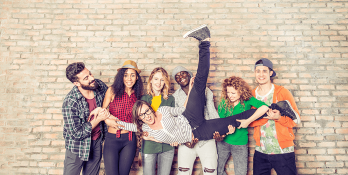Credit Union Marketing Strategies for Generation Z? a group of young adults holding up their friend