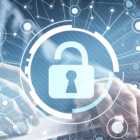Image: Digital padlock with persons hands in the background