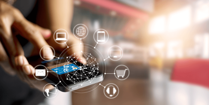 How to Create a Seamless Customer Experience Using Omnichannel? a person looking at a phone