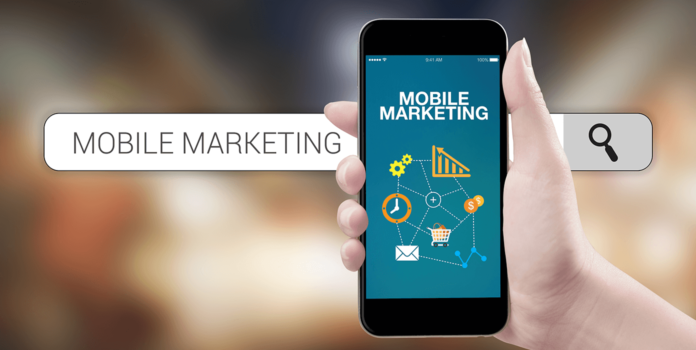 5 Ways Text Messaging Improves Your Customer Service Strategy person holding a smartphone