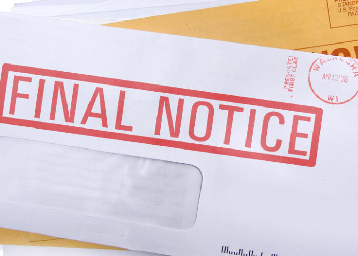 Stack of envelopes with "final notice" stamp
