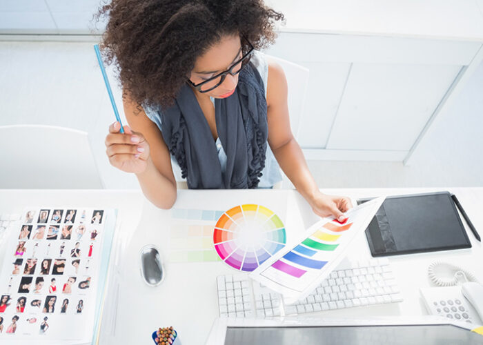 Woman choose color from color wheel