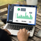 Person reviewing chart on laptop