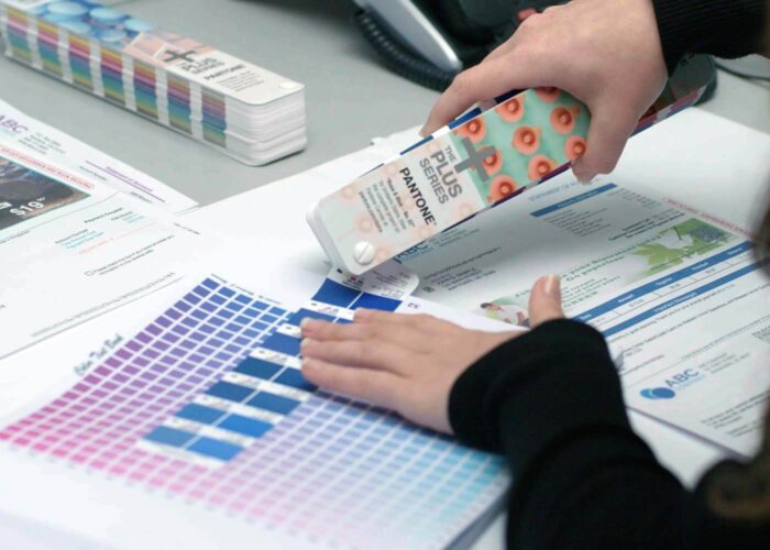 person doing color management on a document