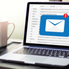 Image: Computer with a mail icon on the screen.