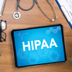 Tablet that says HIPAA and a stethoscope