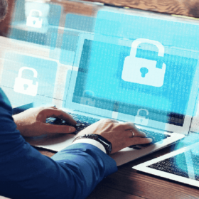 person working on a computer with a padlock overlaid on it.