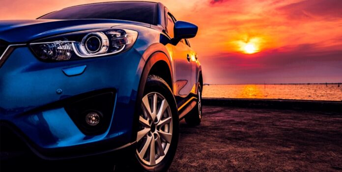 Car with a Sunset in the Background.