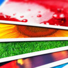 Close-up of colorful postcards.