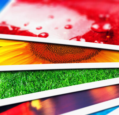 Close-up of colorful postcards.
