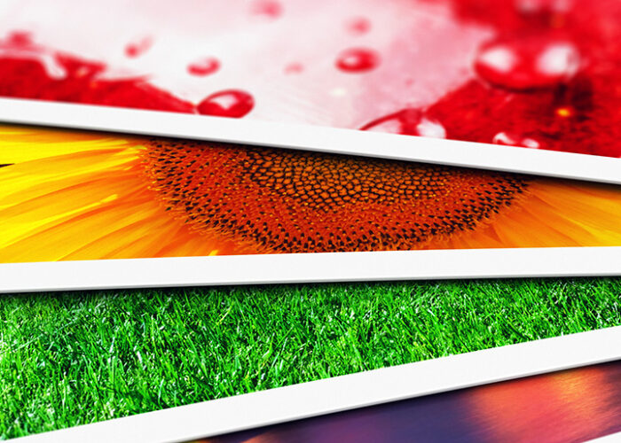 Close-up of colorful postcards.