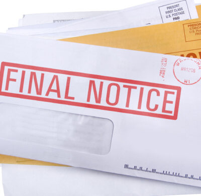 Stack of envelopes with "final notice" stamp.
